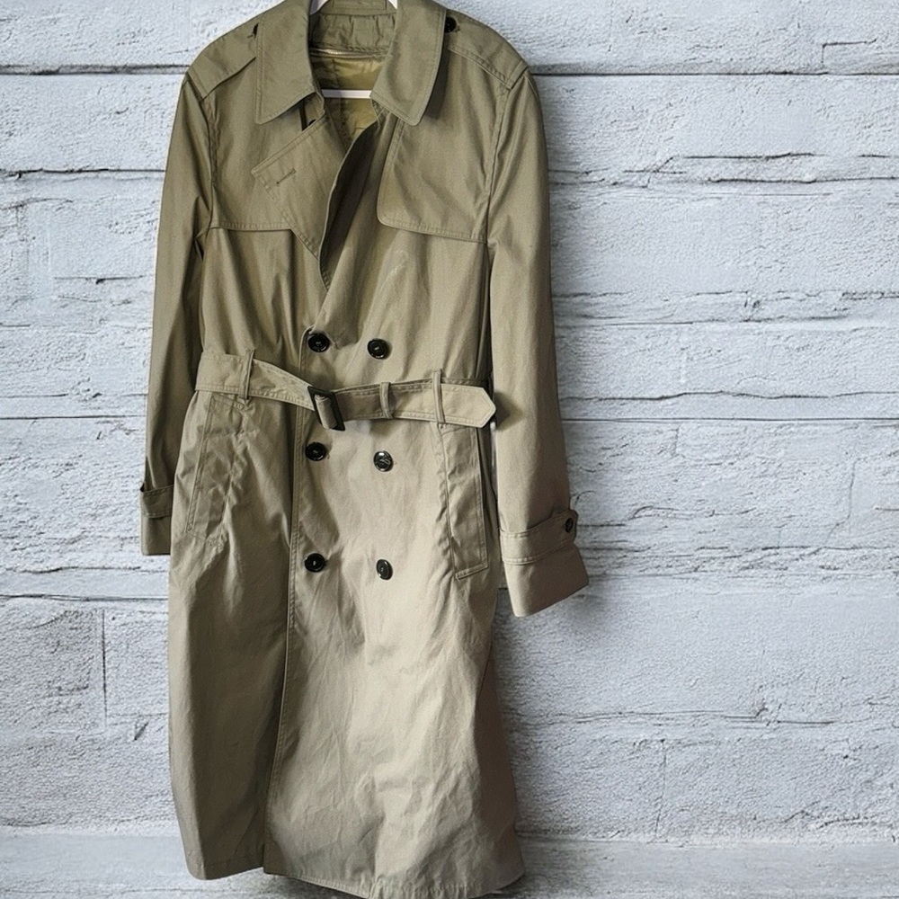 I think this is a man’s military uniform rain jacket but just-in-case its both